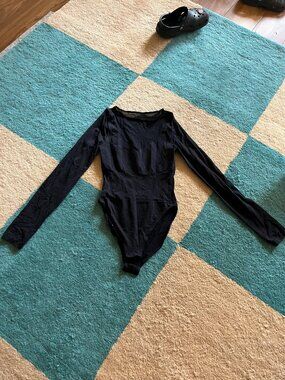 Wolford black long-sleeve sheer bodysuit